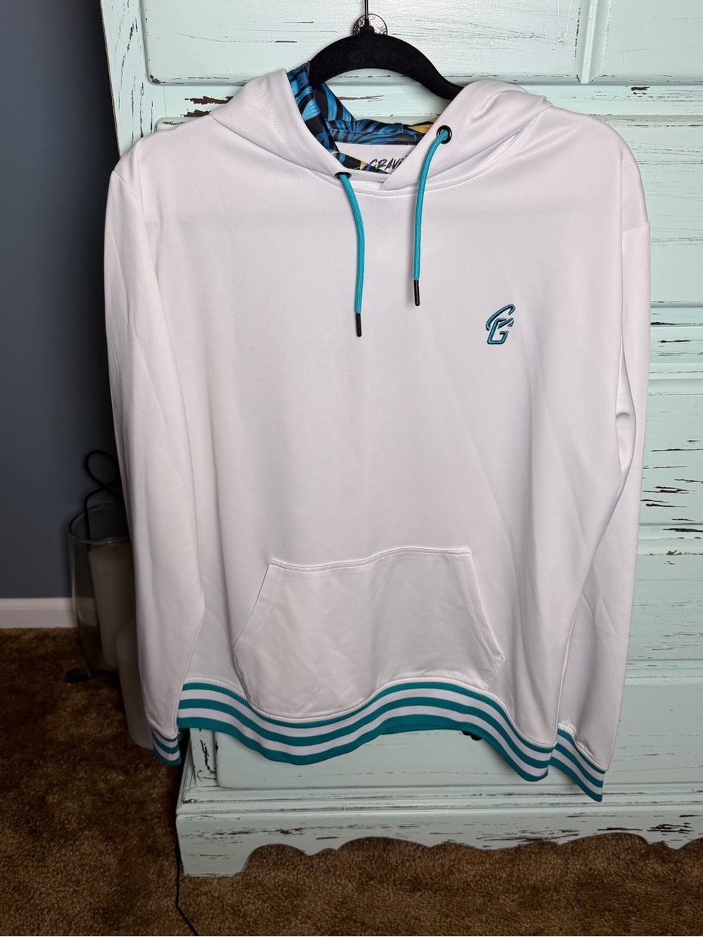 Cravin Golf Men's White Hoodie with Teal Trim. Size medium.